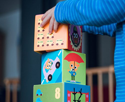 Pediatrics patient playing with blocks