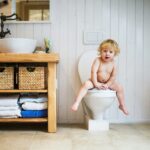 child on toilet