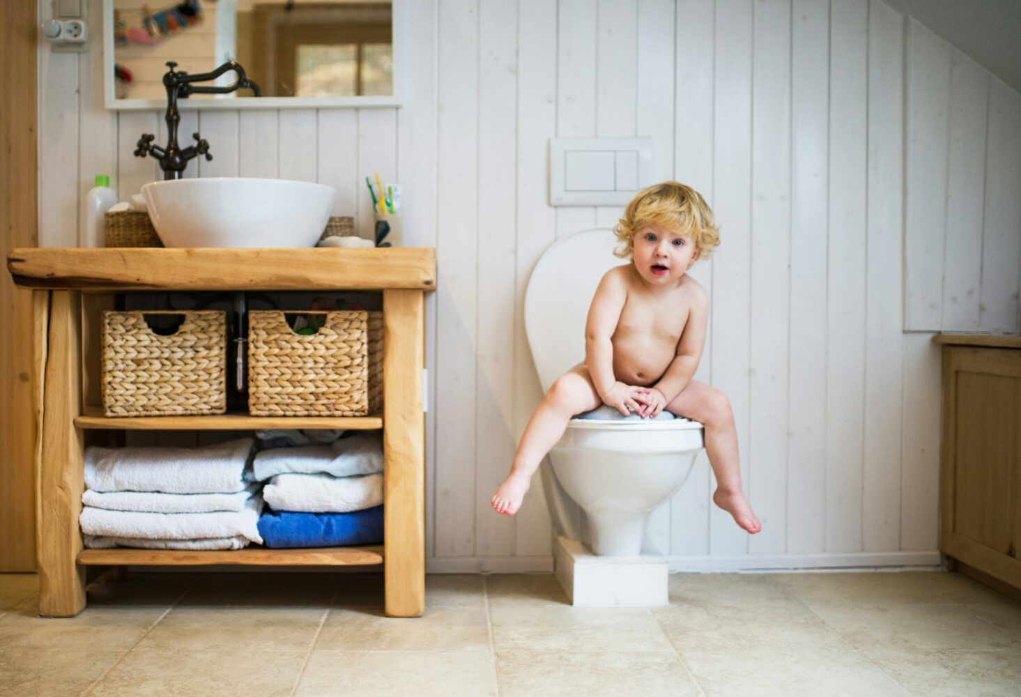 child on toilet